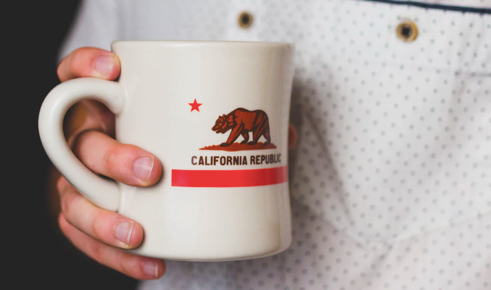 california hr employee using coffee mug