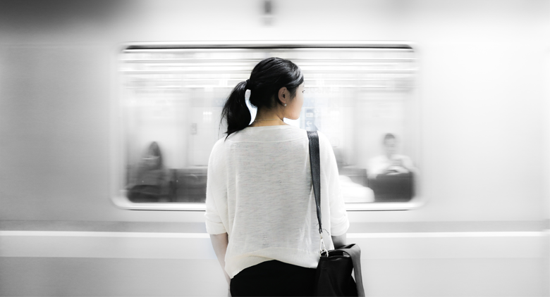 A woman headed home via the subway